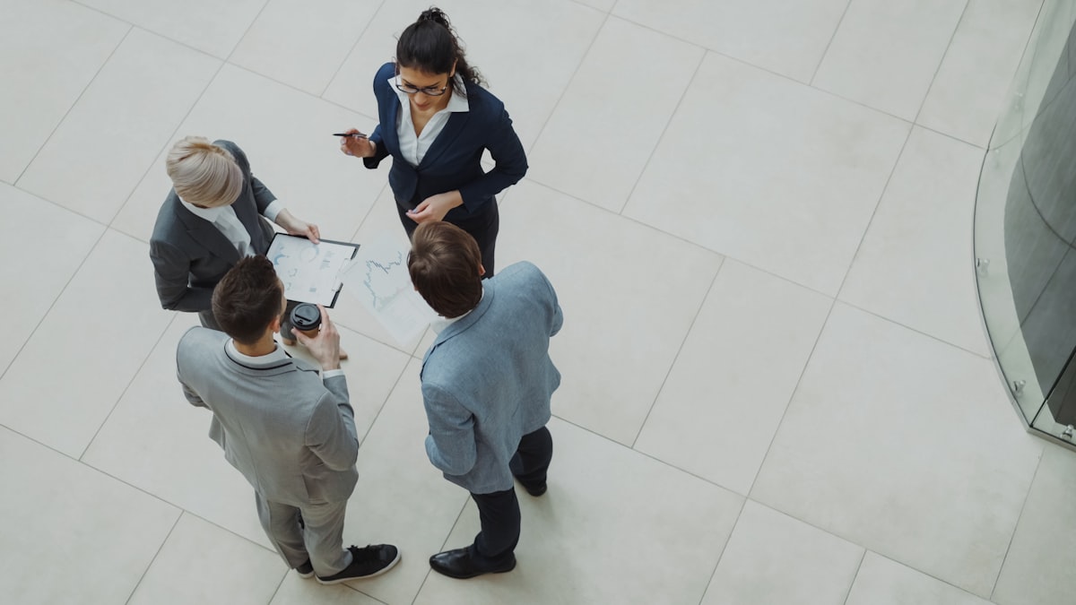 Team collaborating around a table with structured data